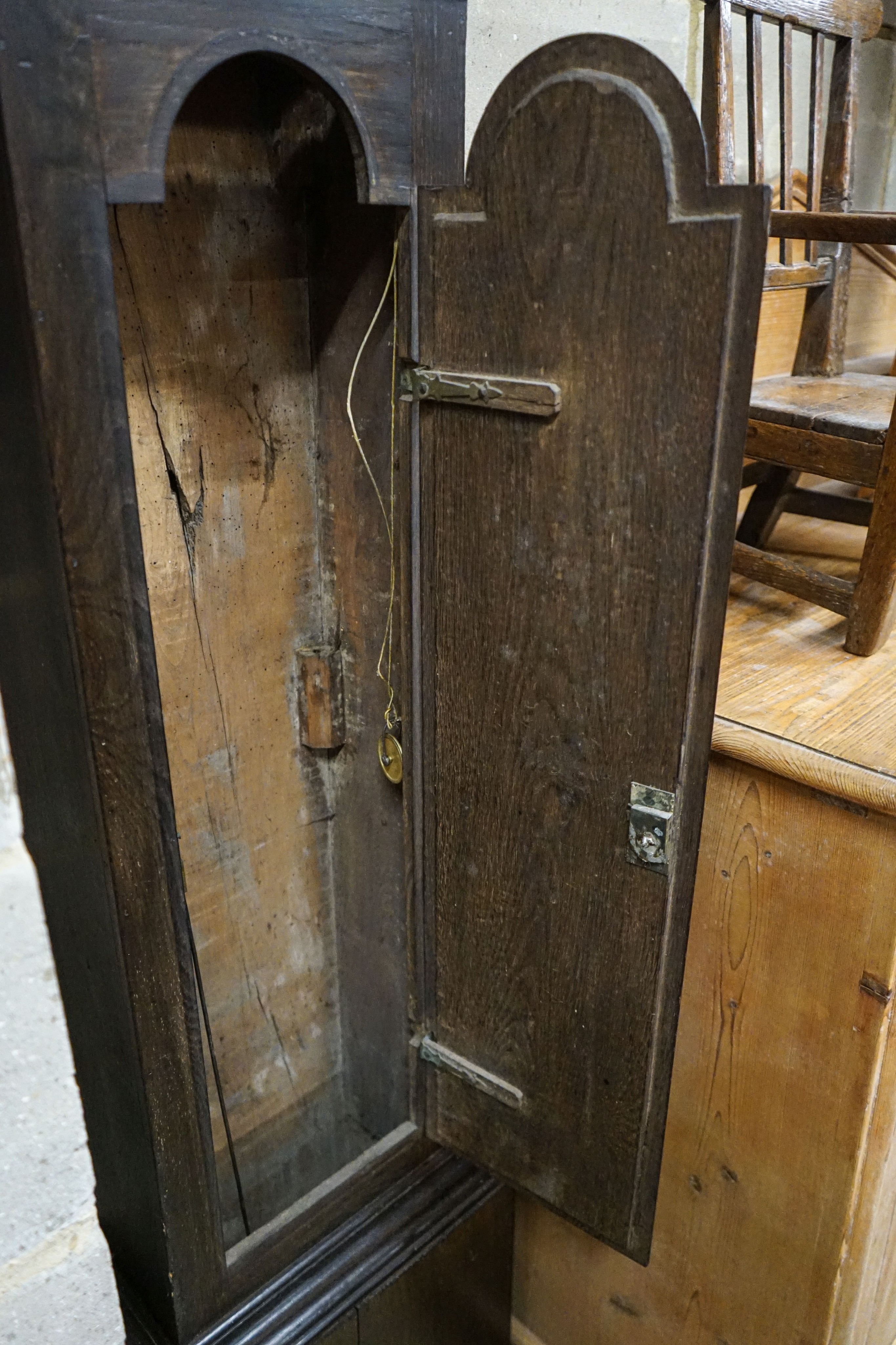 A late 18th century oak eight day longcase clock, with brass Tempus Fugit dial, height 214cm